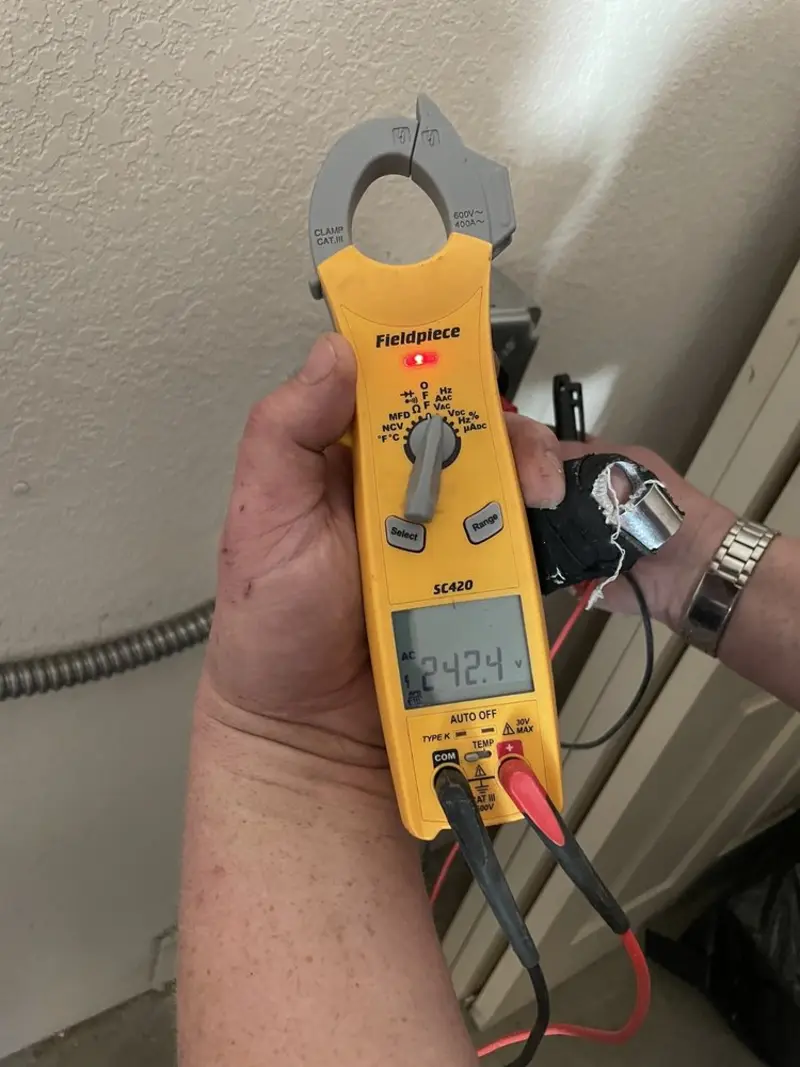 Voltage testing with clamp meter during Generator Installation in Wells Branch